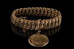 Bracelet à maille américaine en or jaune 18k (750 millièmes)...