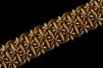 Bracelet à maille articulée entrecroisée de bâtonnets amatis en or...